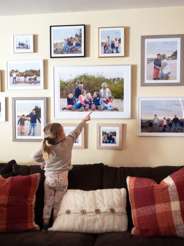 How To Create a Wall Collage of Picture Frames - Frame of Mind