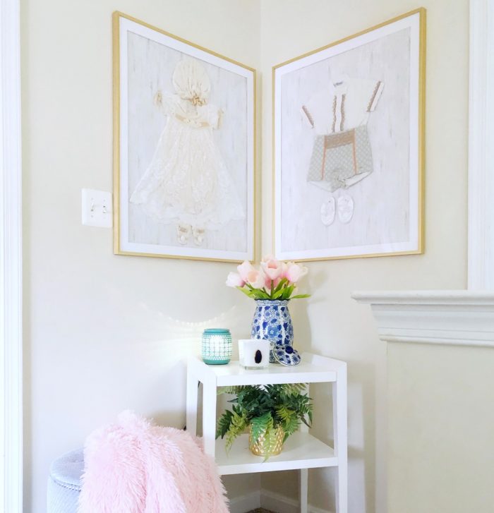 baby clothes in golden frames