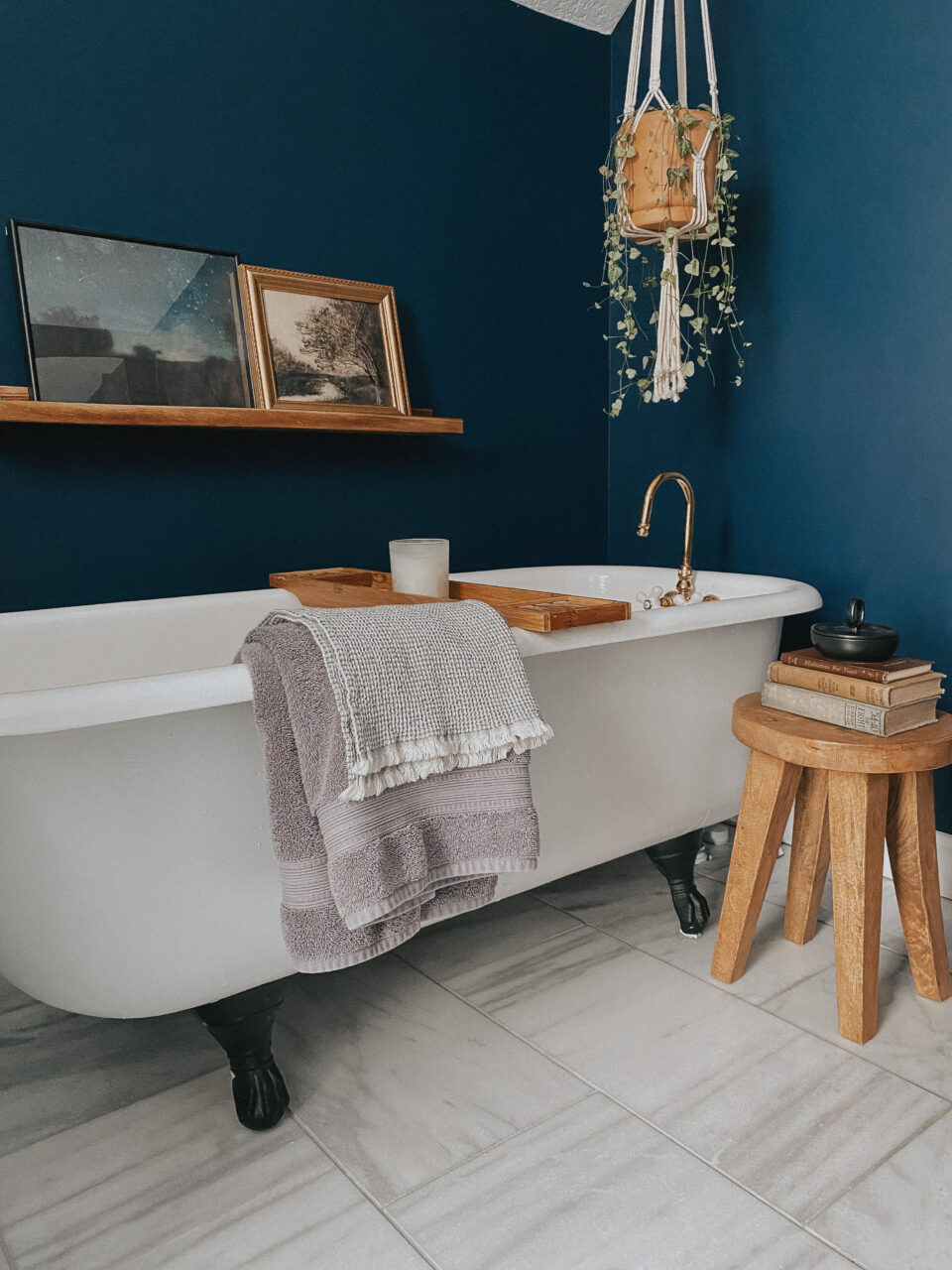 luxurious linens in moody bathroom