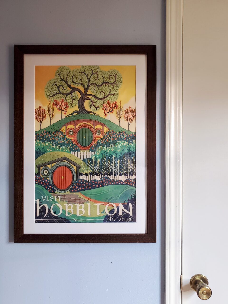 Hobbiton poster framed in a wood picture frame