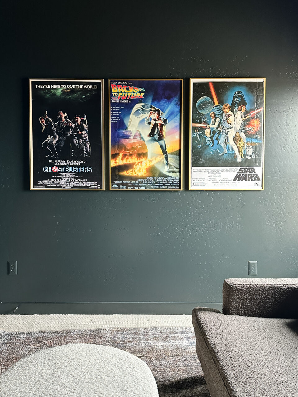 colorful movie posters on a colorful wall
