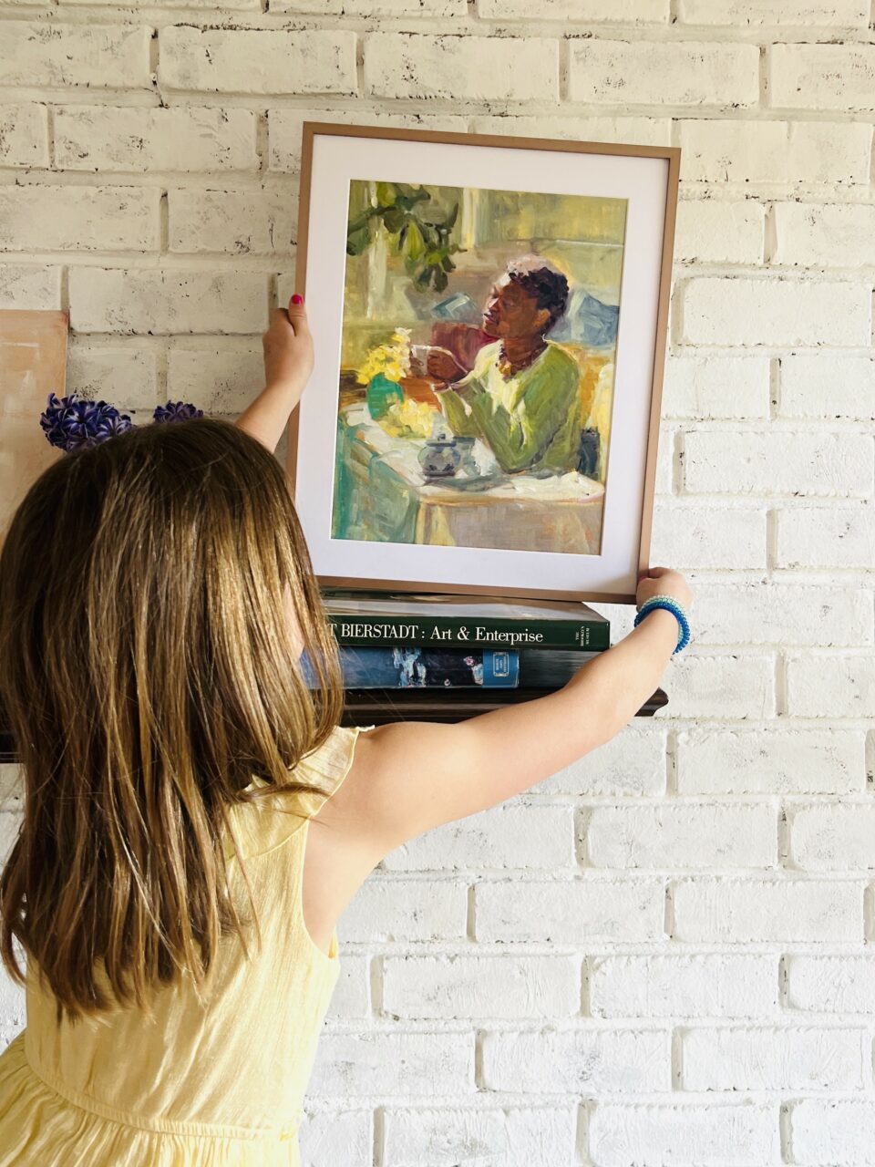 little girl with art print