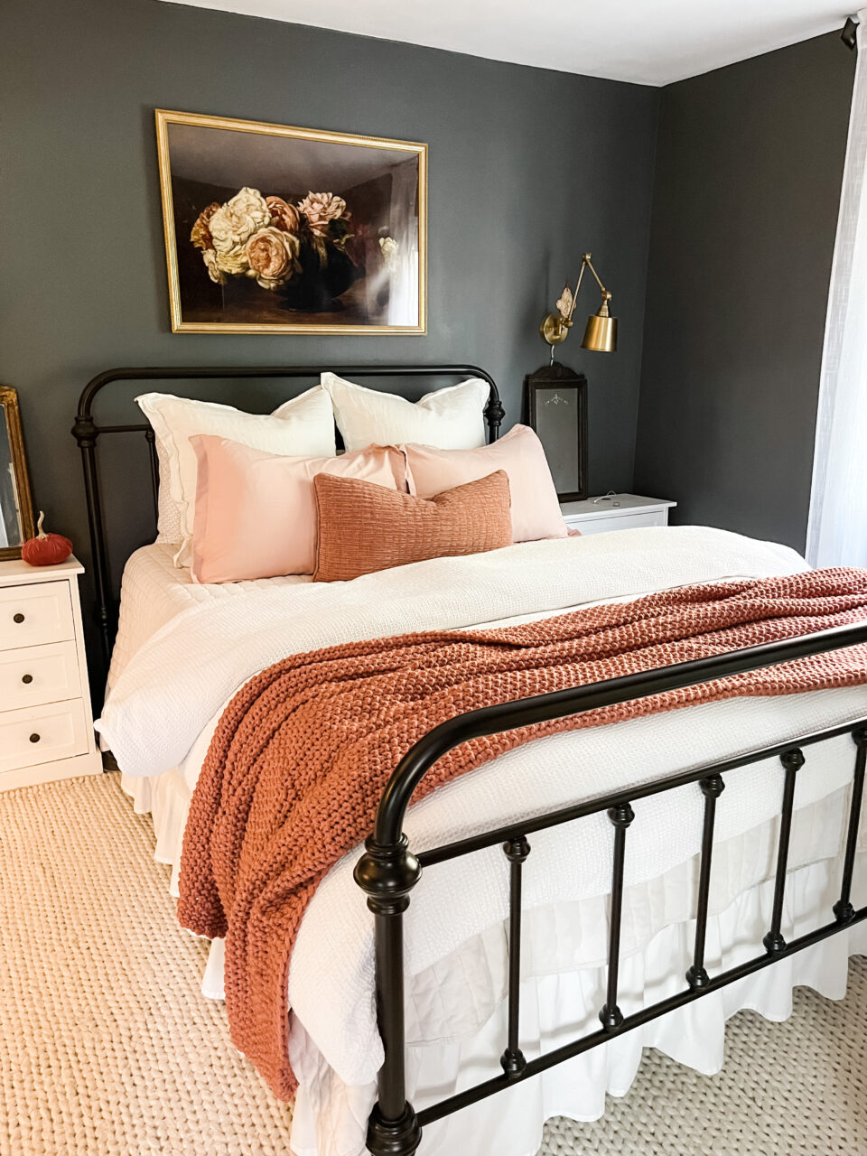 teenage girl's bedroom with large framed art above the bed