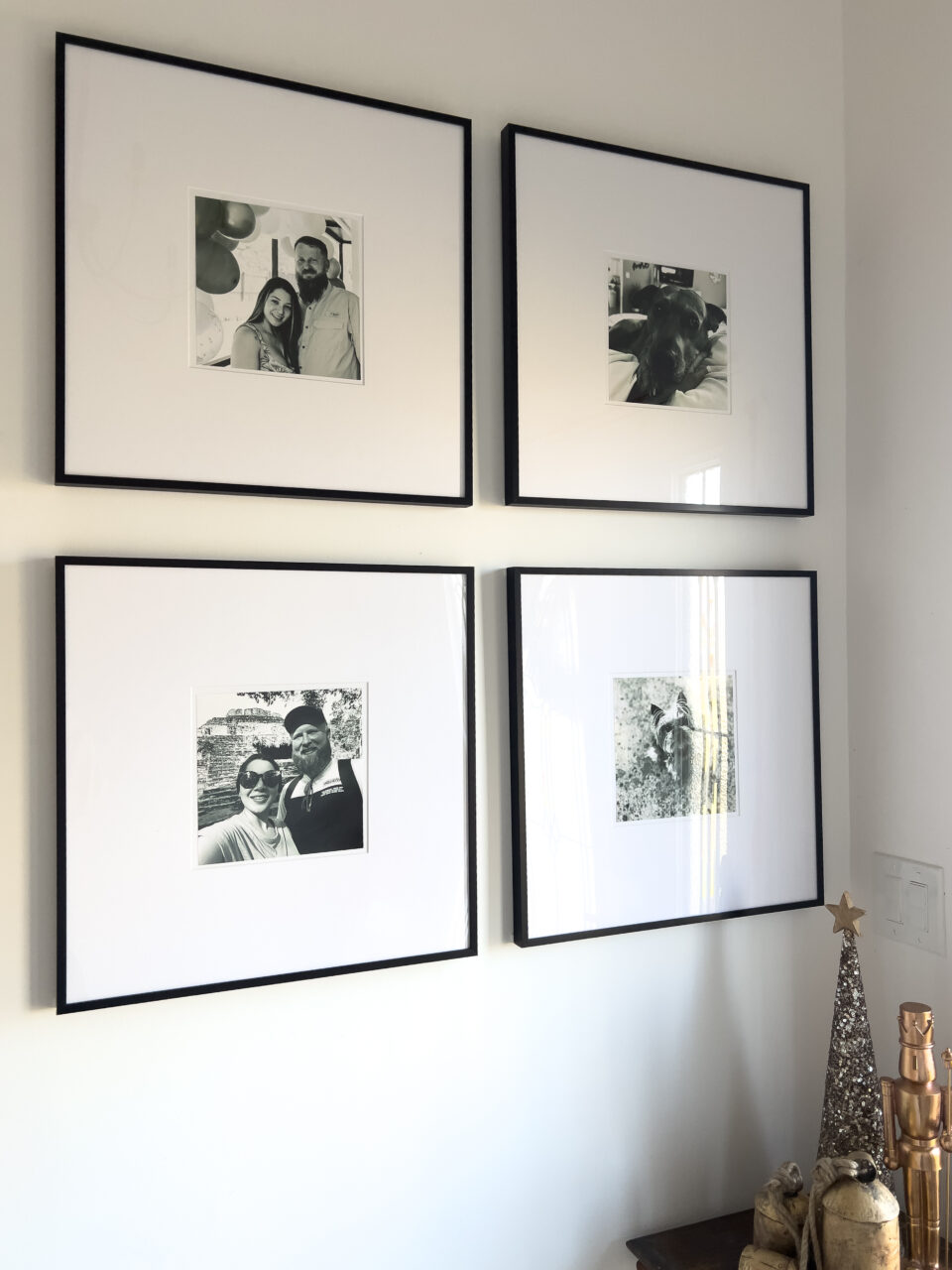 gallery wall with black and white photos