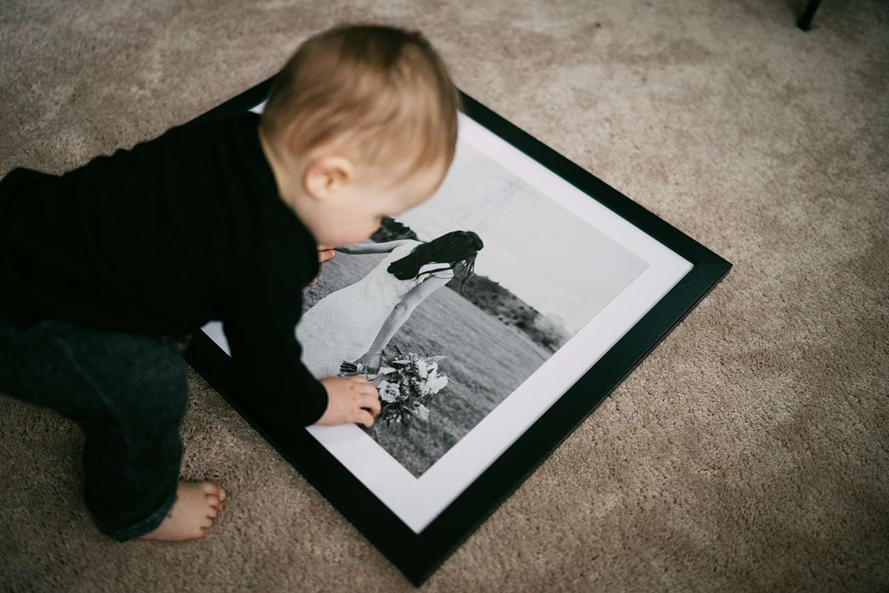 black and white photo in a black picture frame
