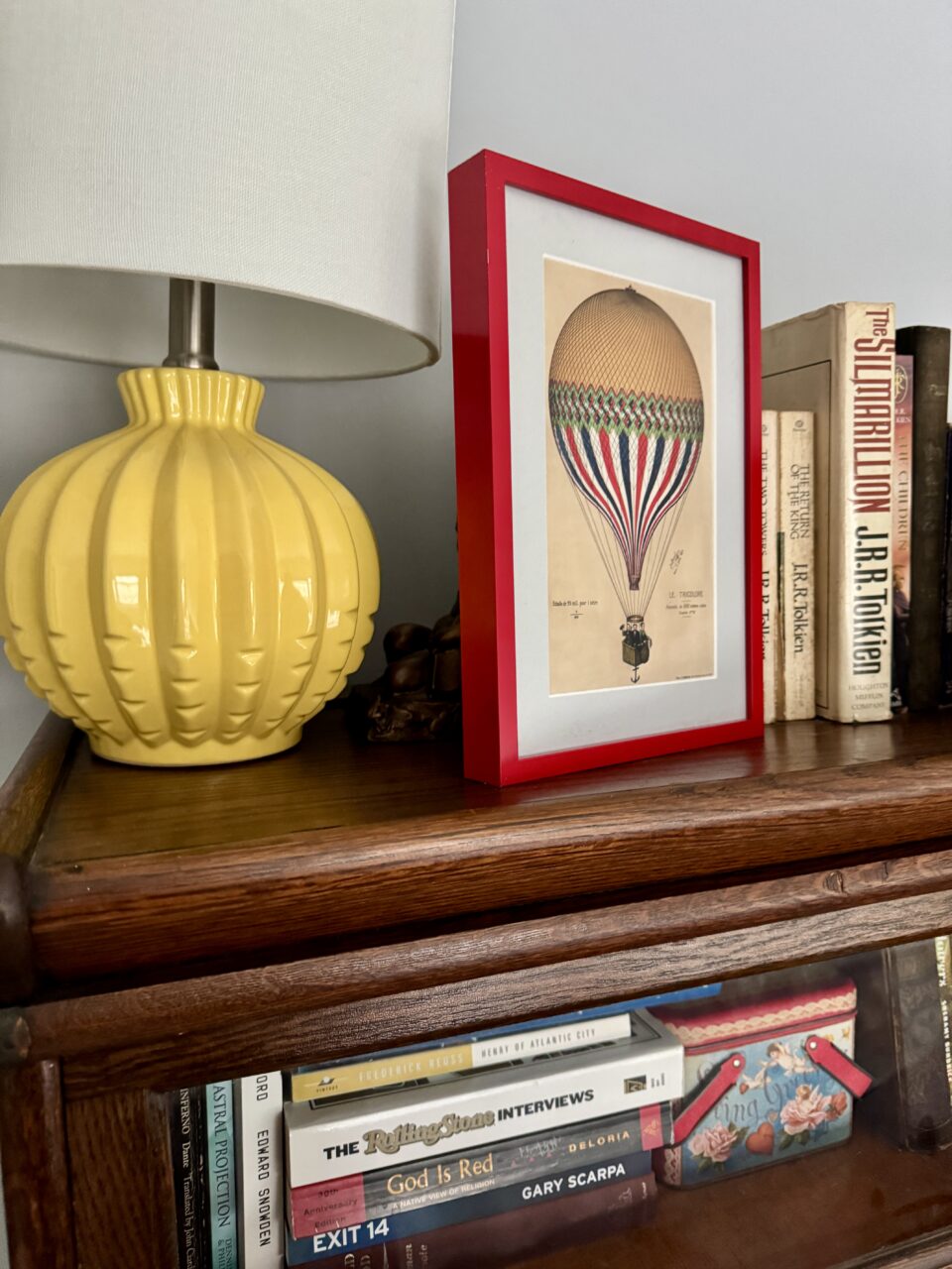 frames on a bookshelf